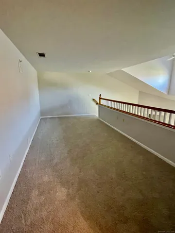 a view of a room with an empty space