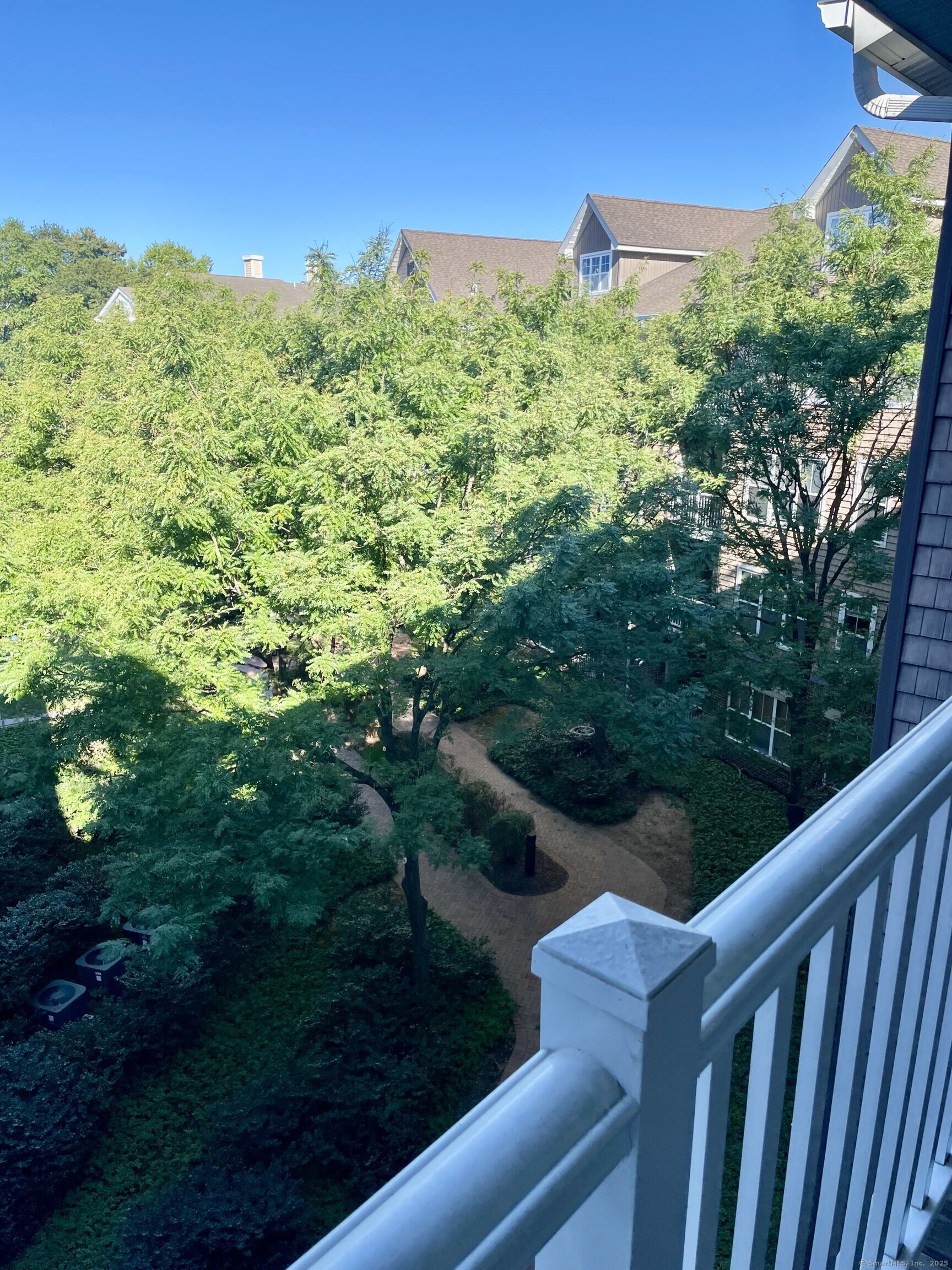 35 West Broad Street, Unit 412 Stamford, CT 06902 - Photo 27 of 35 a view of a garden from a balcony