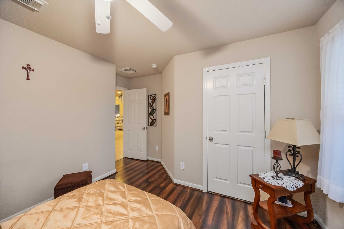 3022 Pathfinders Pass Spring, TX 77373 - Photo 11 of 24 a bedroom with a bed and a lamp on table