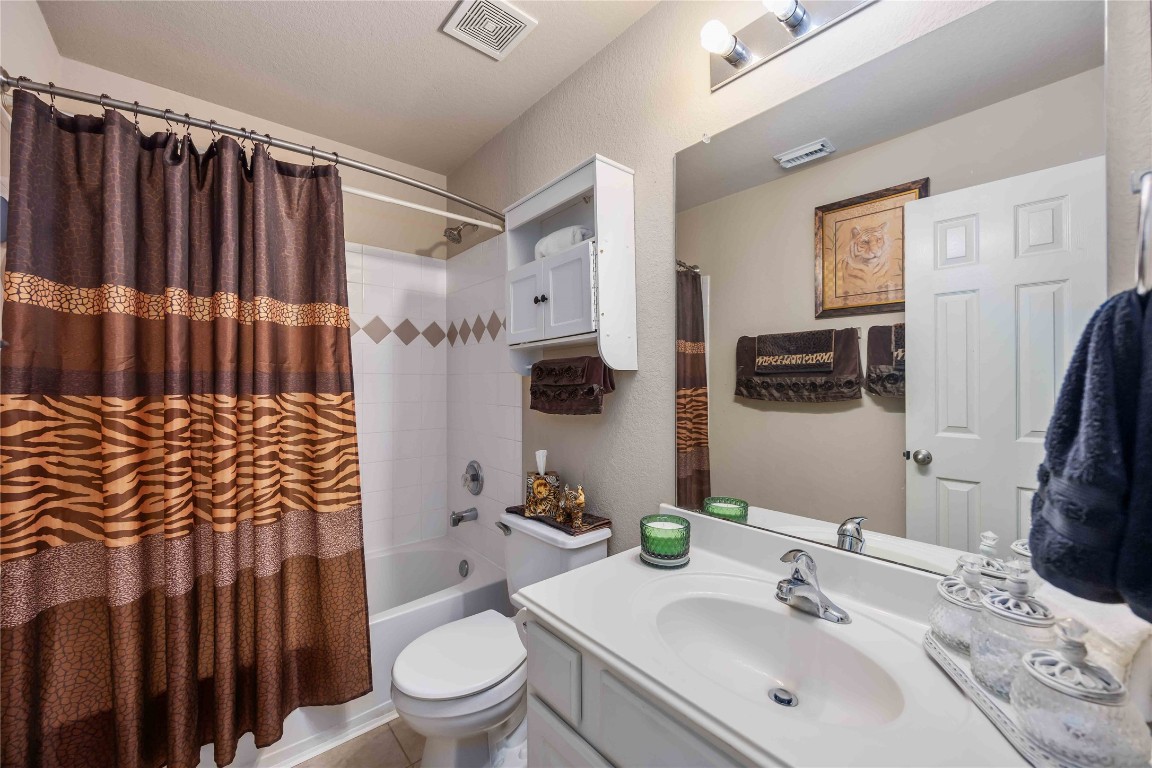 3022 Pathfinders Pass Spring, TX 77373 - Photo 16 of 24 a bathroom with a sink toilet and shower