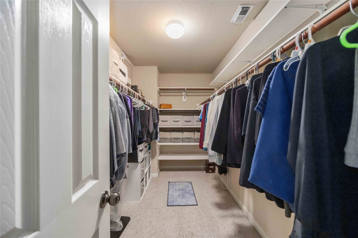 3022 Pathfinders Pass Spring, TX 77373 - Photo 21 of 24 a view of walk in closet with clothes