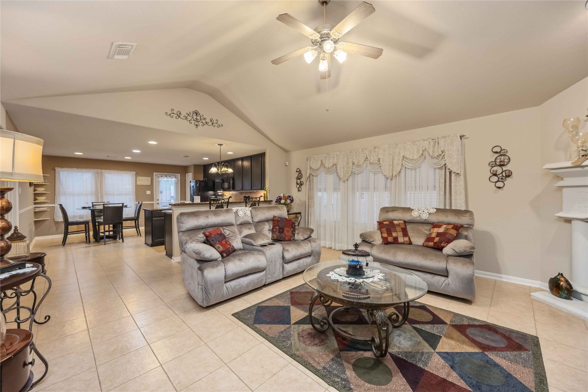 3022 Pathfinders Pass Spring, TX 77373 - Photo 9 of 24 a living room with furniture and kitchen view
