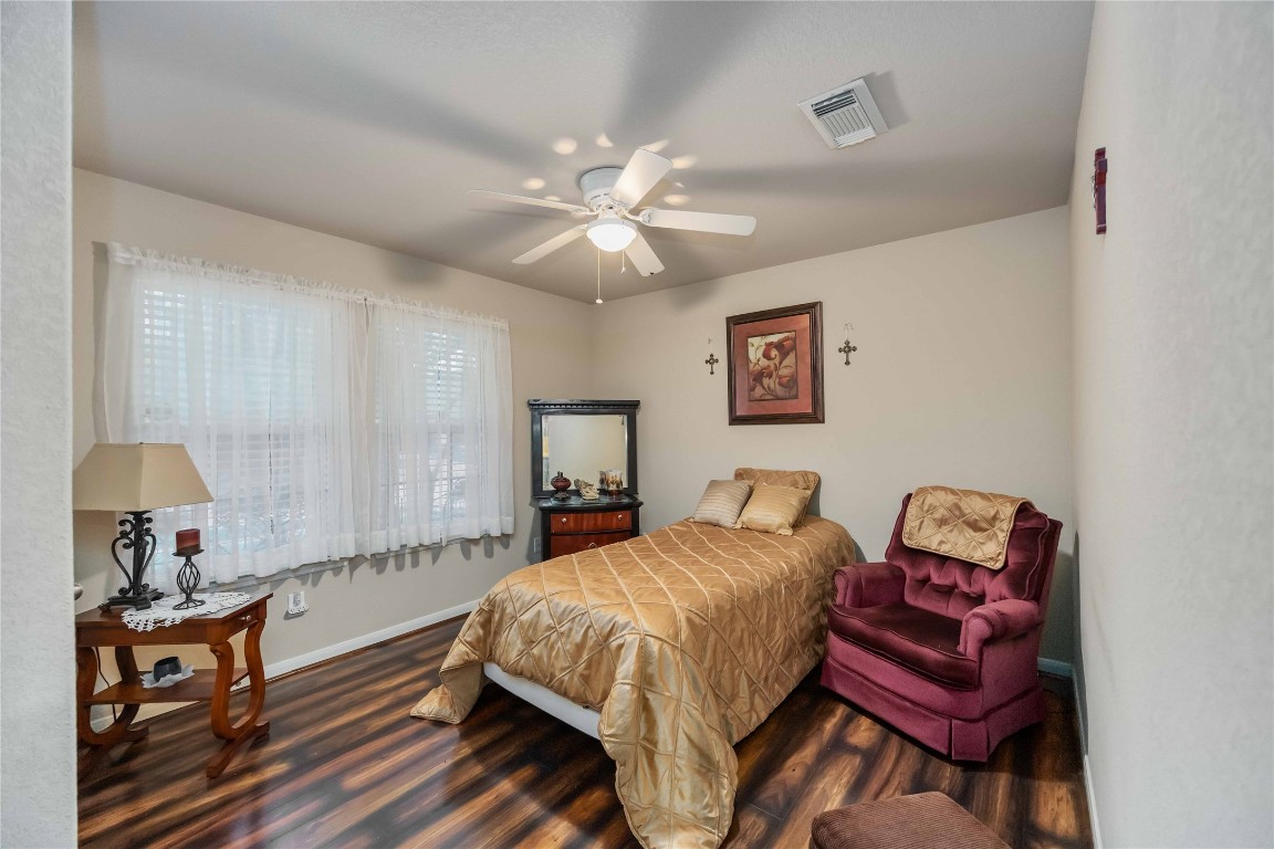 3022 Pathfinders Pass Spring, TX 77373 - Photo 10 of 24 a bedroom with a bed and a couch