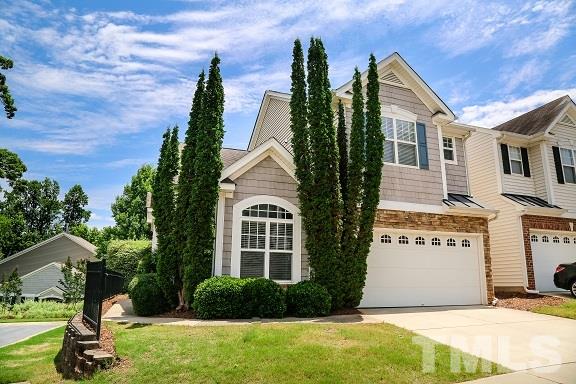 8312 Chimneycap Drive Raleigh, NC 27613 - Photo 2 of 25 a front view of a house with garden