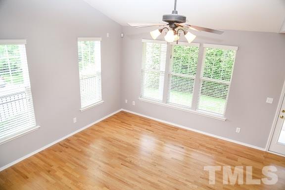 8312 Chimneycap Drive Raleigh, NC 27613 - Photo 13 of 25 a view of an empty room with a window