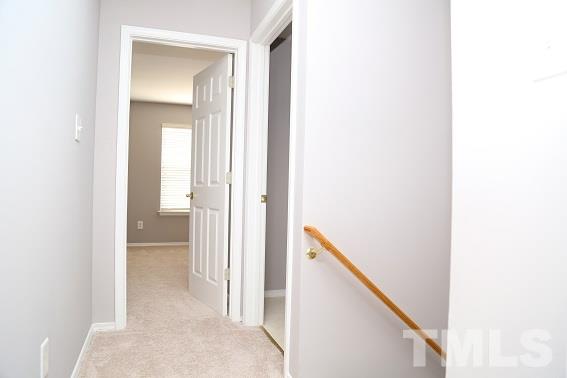 8312 Chimneycap Drive Raleigh, NC 27613 - Photo 14 of 25 a view of a bathroom from a hallway