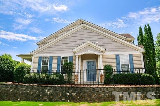 8312 Chimneycap Drive Raleigh, NC 27613 - Photo 3 of 25 a front view of a house with a yard
