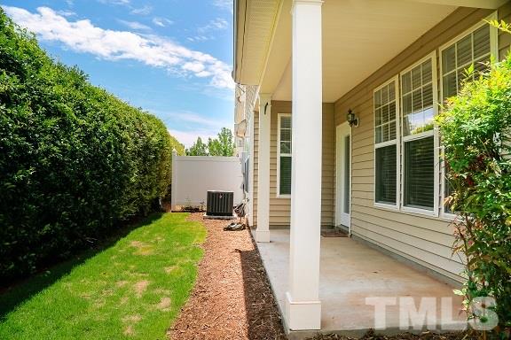 8312 Chimneycap Drive Raleigh, NC 27613 - Photo 24 of 25 a view of a backyard with garden