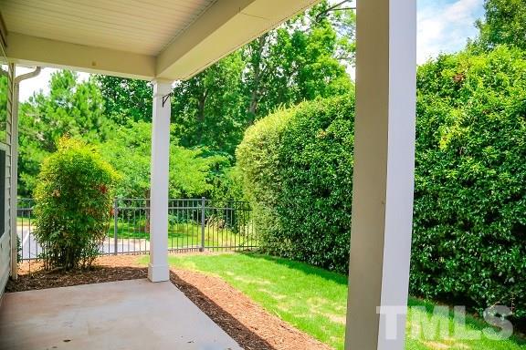 8312 Chimneycap Drive Raleigh, NC 27613 - Photo 25 of 25 a view of a garden with large trees