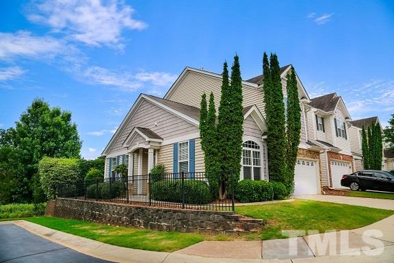 8312 Chimneycap Drive Raleigh, NC 27613 - Photo 4 of 25 a front view of house with yard and green space