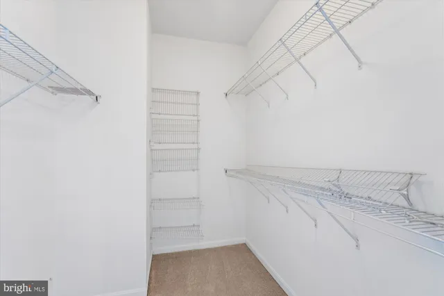 a view of a room with racks on the wall