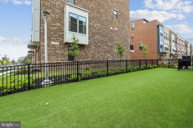 a front view of building with outdoor seating