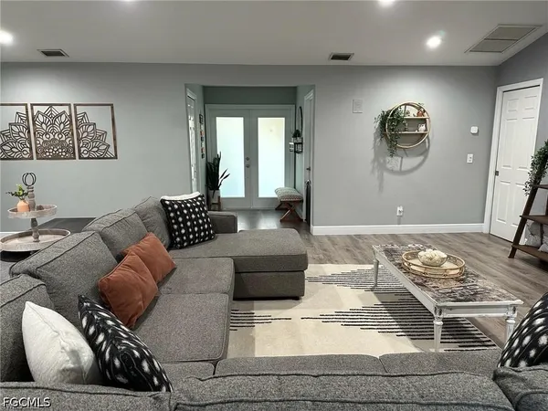 a living room with furniture and a couch