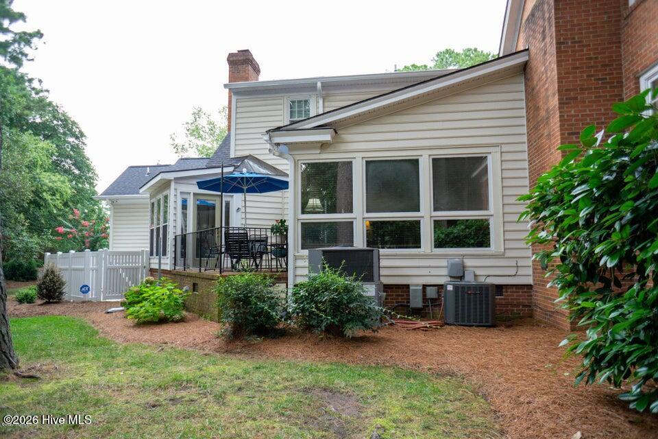 114 Canterbury Road Northwest Wilson, NC 27896 - Photo 31 of 35 30_Back View of Sunroom-Patio