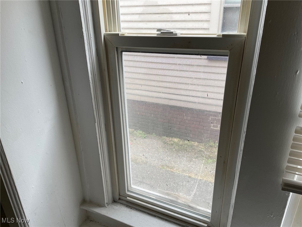 13428 Hartford Road Cleveland, OH 44112 - Photo 13 of 33 Vinyl windows throughout the house