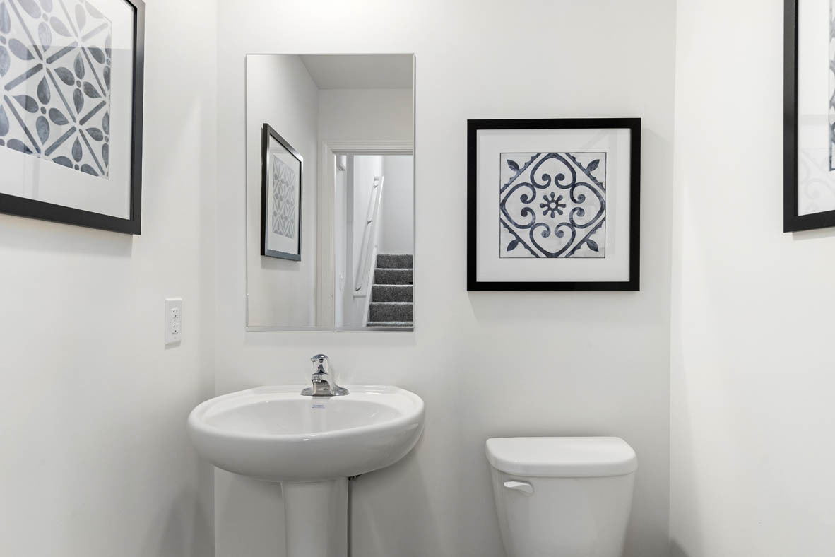 1411 Oakfield Lane Pingree Grove, IL 60140 - Photo 12 of 40 a bathroom with a sink and a mirror