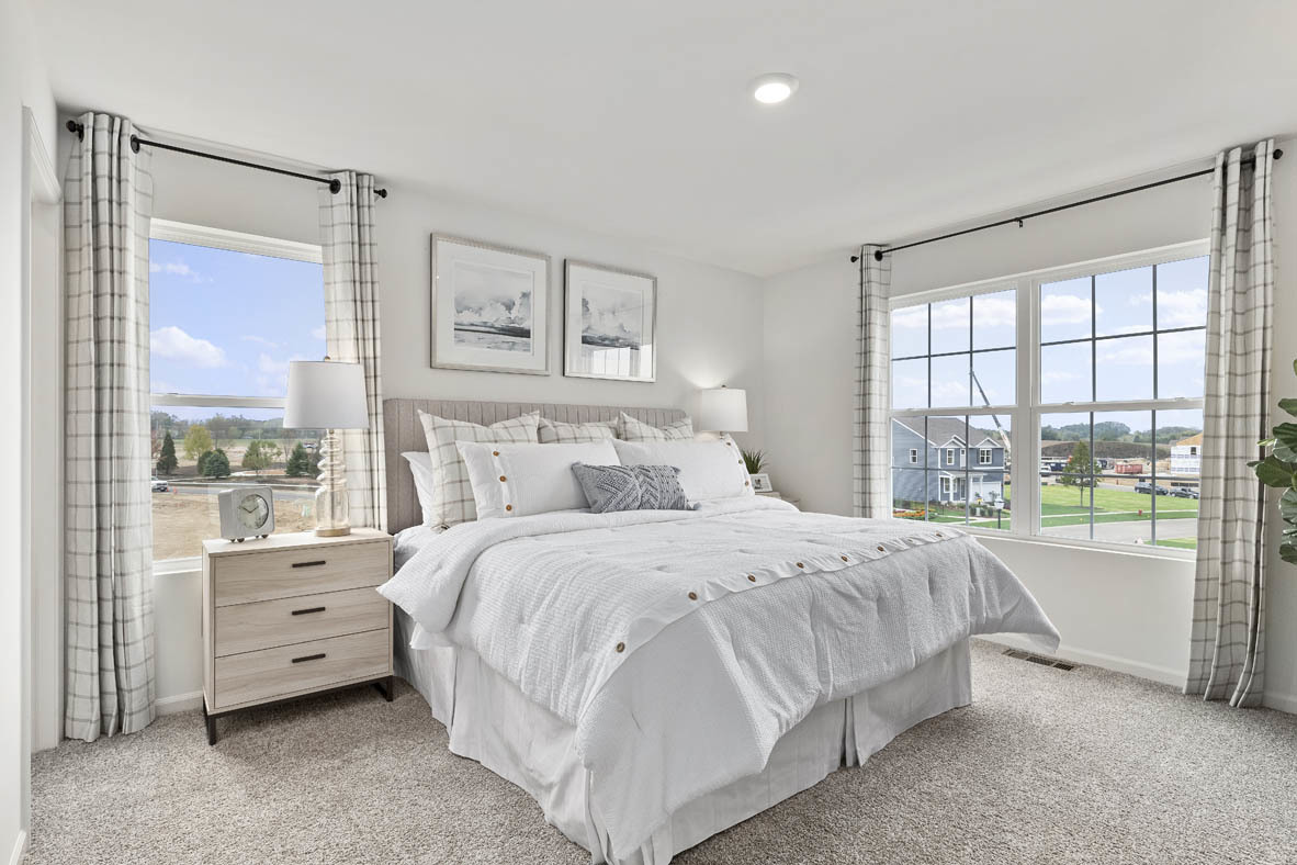 1411 Oakfield Lane Pingree Grove, IL 60140 - Photo 13 of 40 a bedroom with a bed and a large window