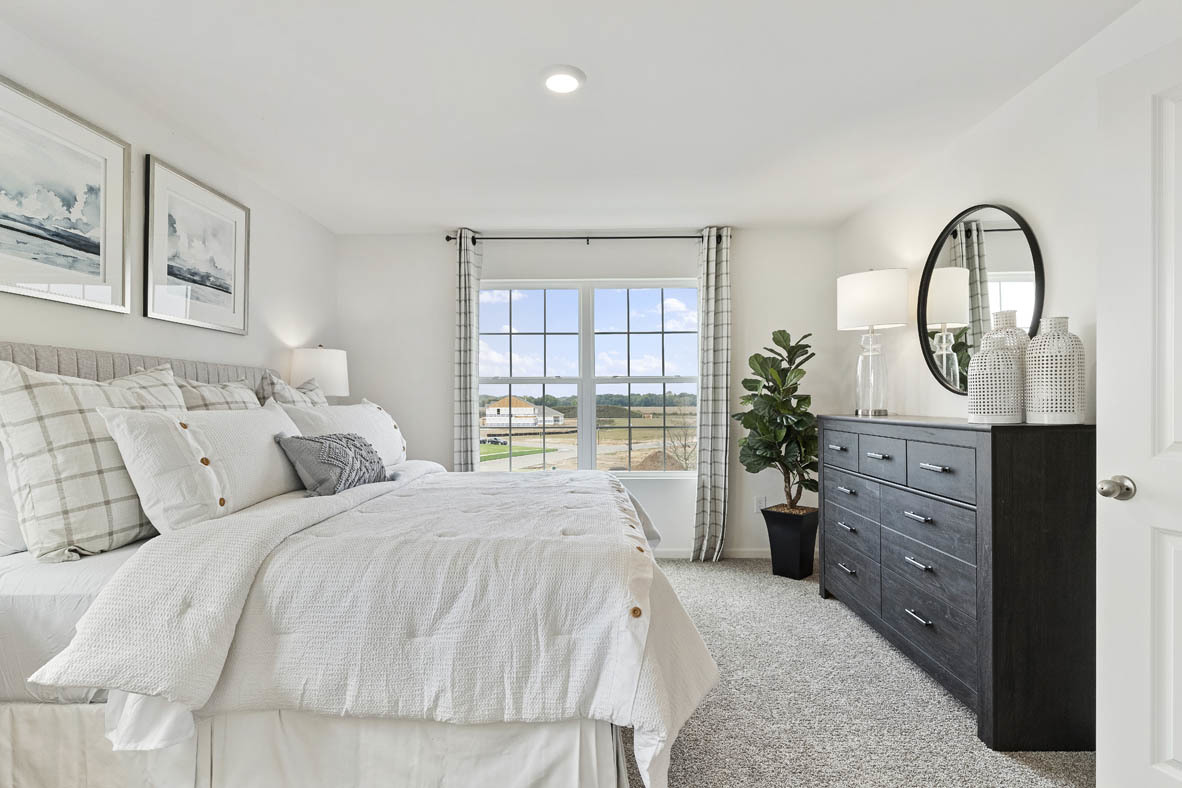 1411 Oakfield Lane Pingree Grove, IL 60140 - Photo 14 of 40 a bedroom with a bed and a window