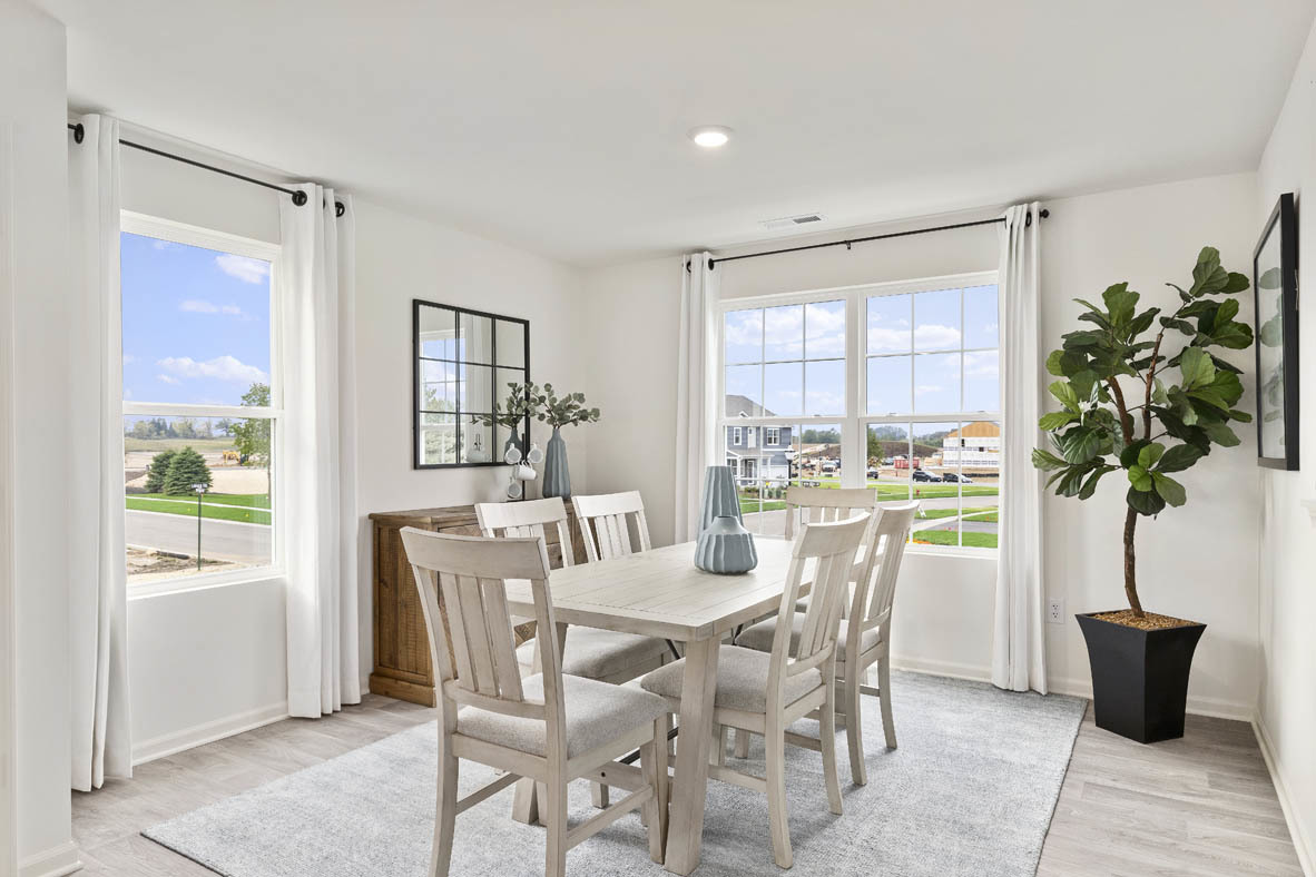 1411 Oakfield Lane Pingree Grove, IL 60140 - Photo 6 of 40 a dining room with furniture and window