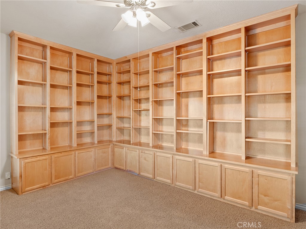 11385 Oak Ridge Drive Oak Hills, CA 92344 - Photo 27 of 69 a view of an empty room with a cabinet and workspace