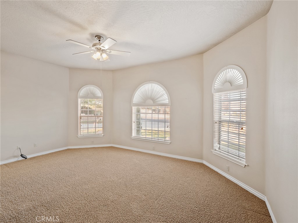 11385 Oak Ridge Drive Oak Hills, CA 92344 - Photo 39 of 69 a view of an empty room with a window