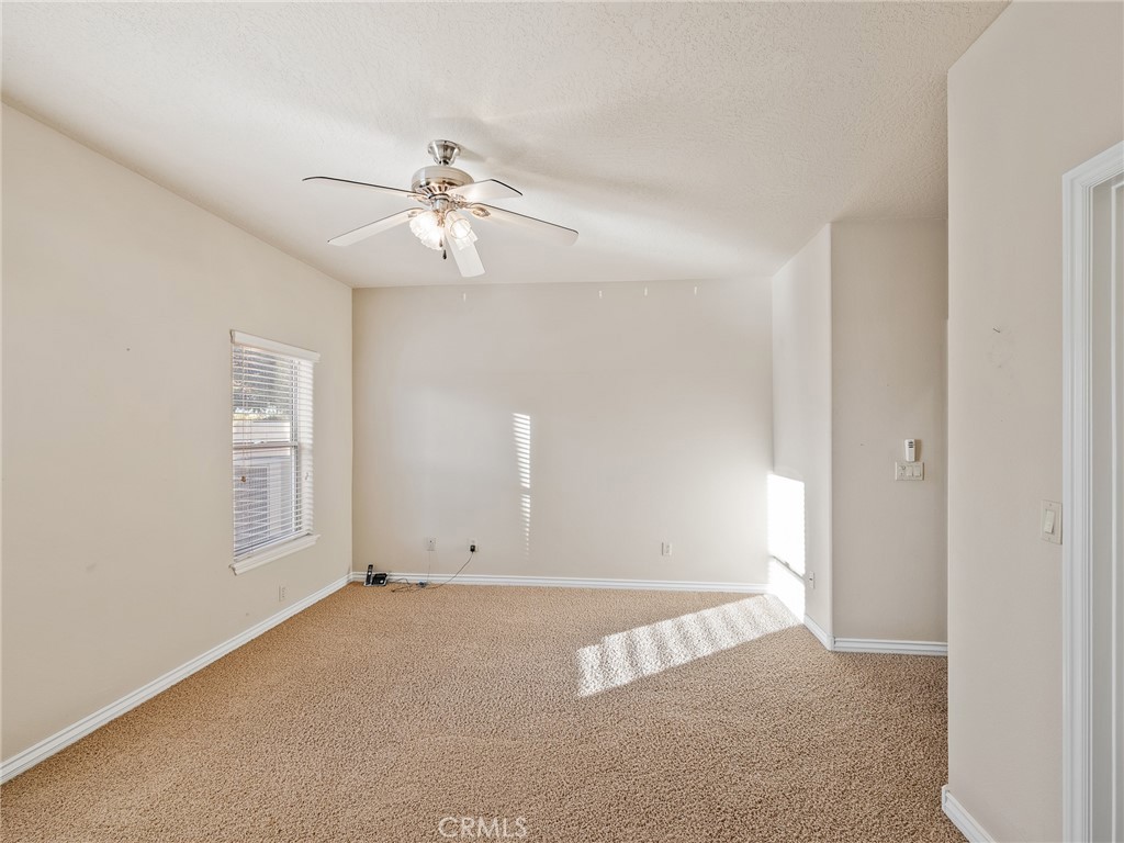 11385 Oak Ridge Drive Oak Hills, CA 92344 - Photo 45 of 69 a view of an empty room with a window