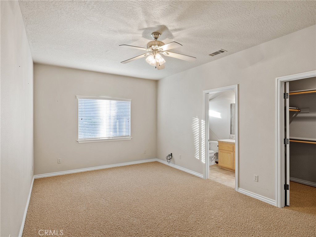 11385 Oak Ridge Drive Oak Hills, CA 92344 - Photo 57 of 69 a view of an empty room with a window