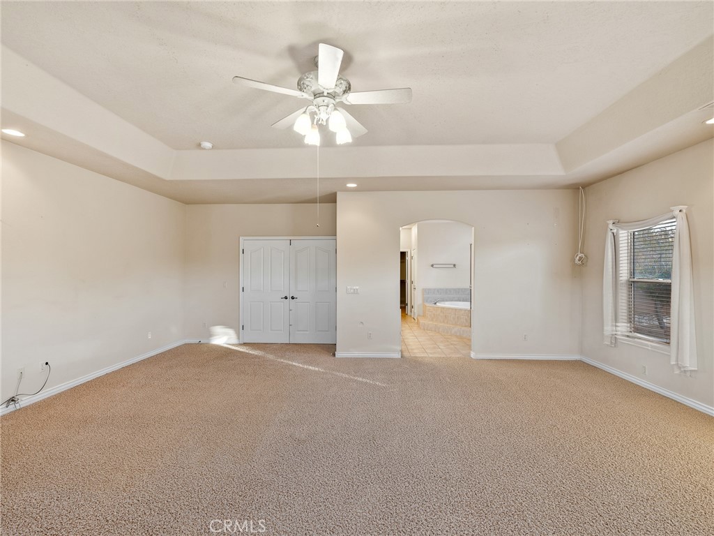 11385 Oak Ridge Drive Oak Hills, CA 92344 - Photo 58 of 69 a view of an empty room with a window