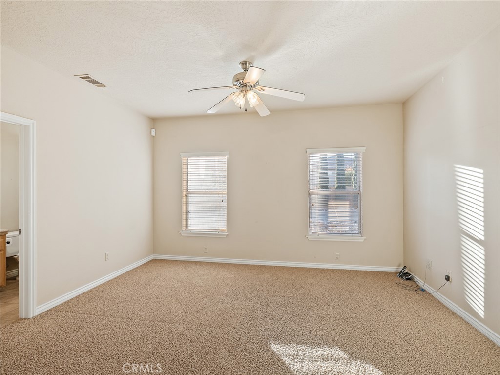 11385 Oak Ridge Drive Oak Hills, CA 92344 - Photo 63 of 69 a view of an empty room with a window