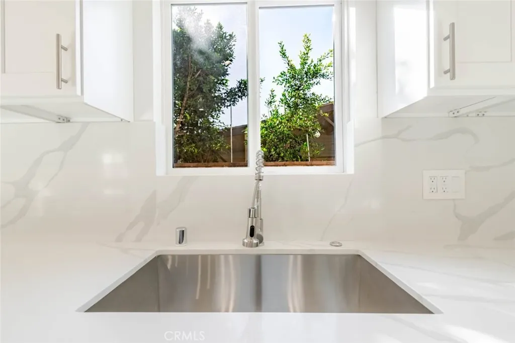 6850 Ranchito Avenue Van Nuys, CA 91405 - Photo 13 of 23 a view of a sink and a window
