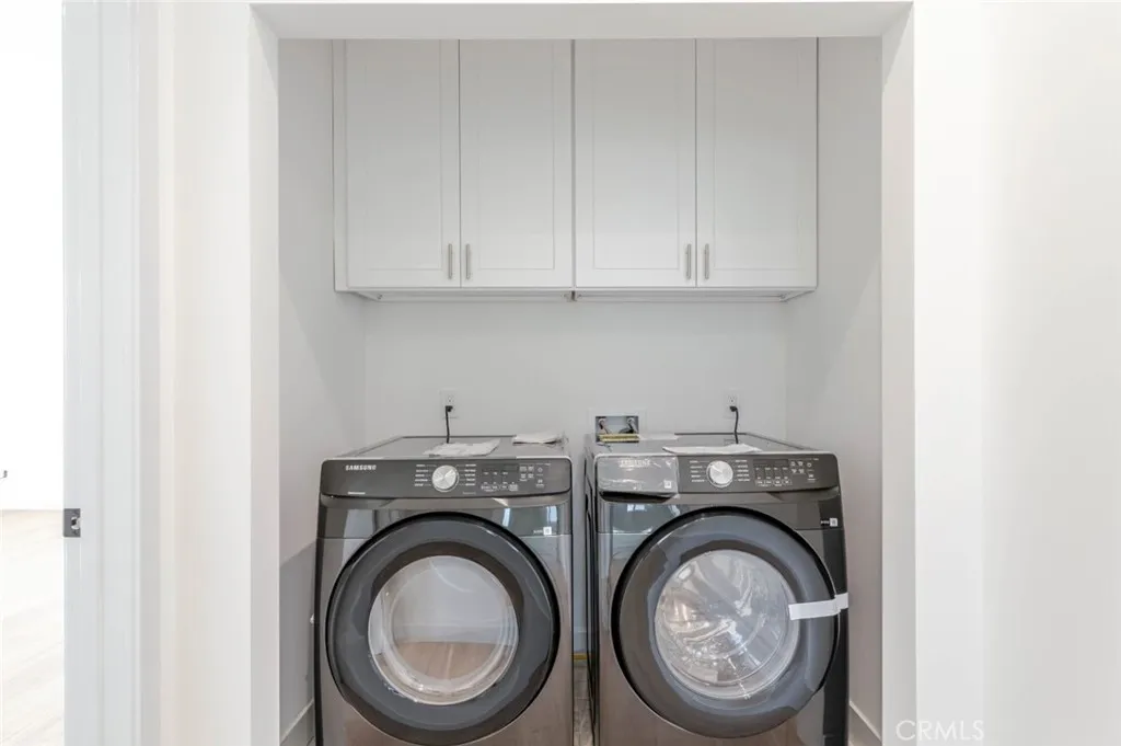 6850 Ranchito Avenue Van Nuys, CA 91405 - Photo 17 of 23 a utility room with dryer and washer
