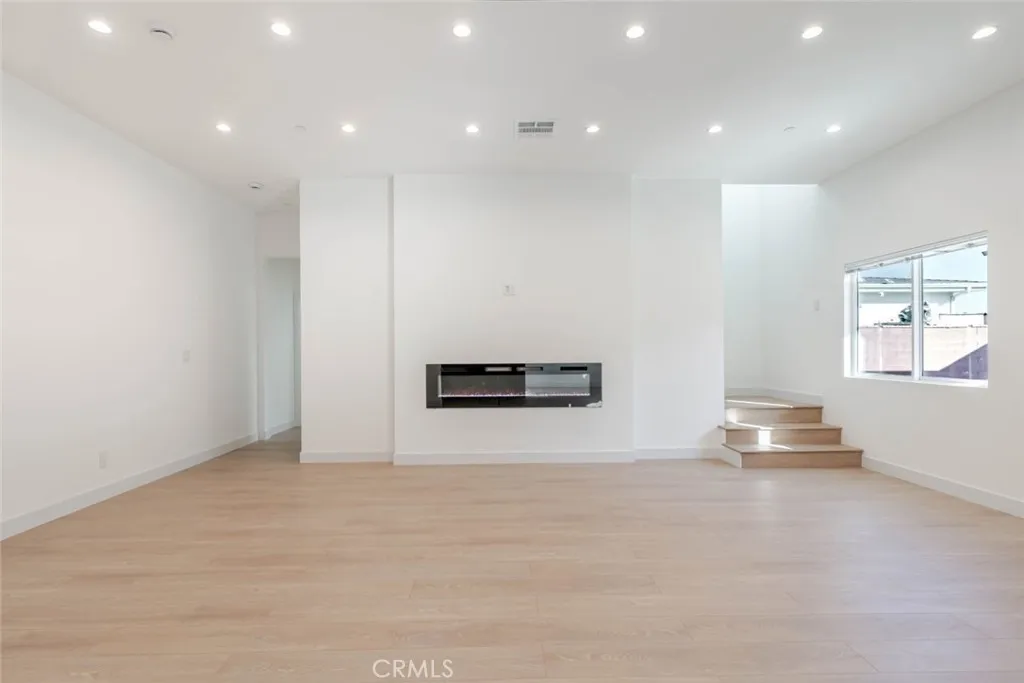 6850 Ranchito Avenue Van Nuys, CA 91405 - Photo 5 of 23 a view of an empty room with a window