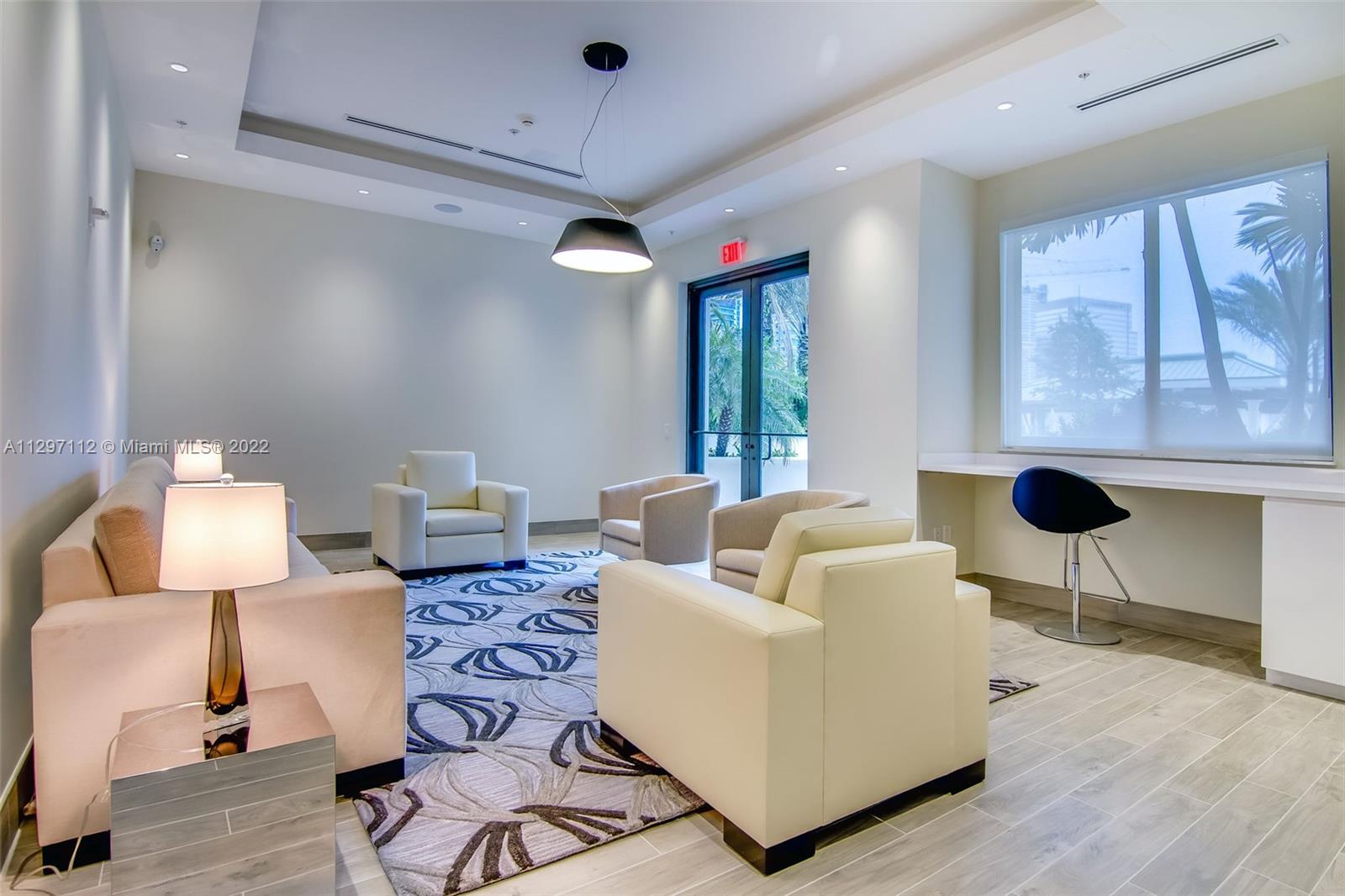 999 Southwest 1st Avenue, Unit 2717 Miami, FL 33130 - Photo 70 of 93 a living room with furniture and a large window