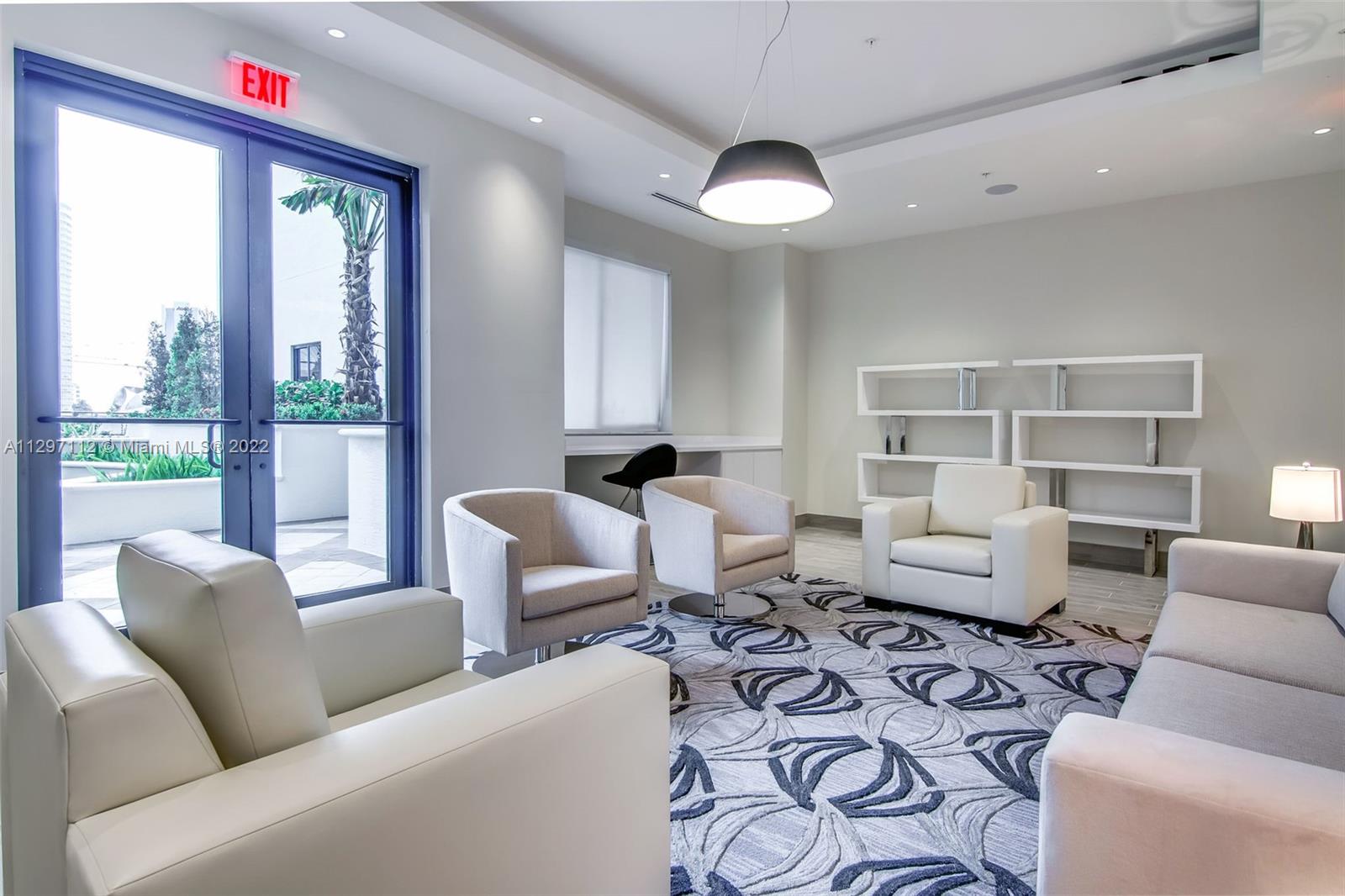 999 Southwest 1st Avenue, Unit 2717 Miami, FL 33130 - Photo 81 of 93 a living room with furniture or couch and a large window