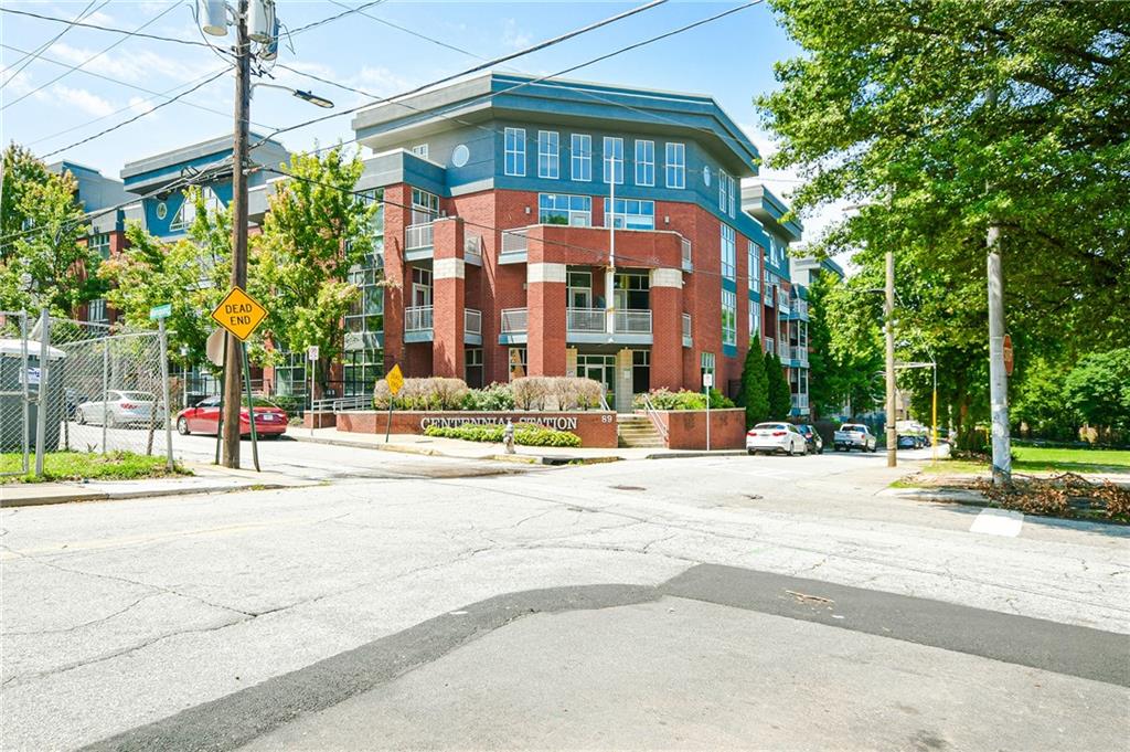 a view of a building with a street