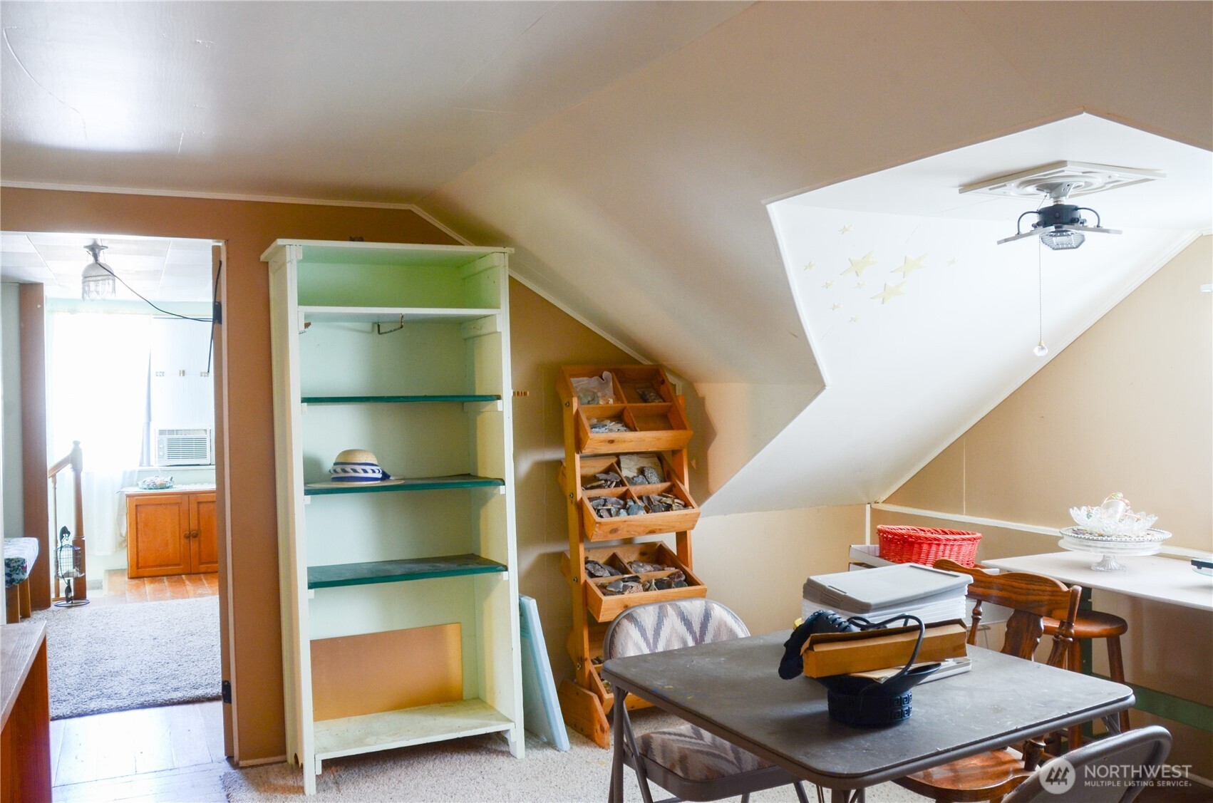 316 East Alder Avenue Ritzville, WA 99169 - Photo 21 of 35 a room with furniture and a book shelf