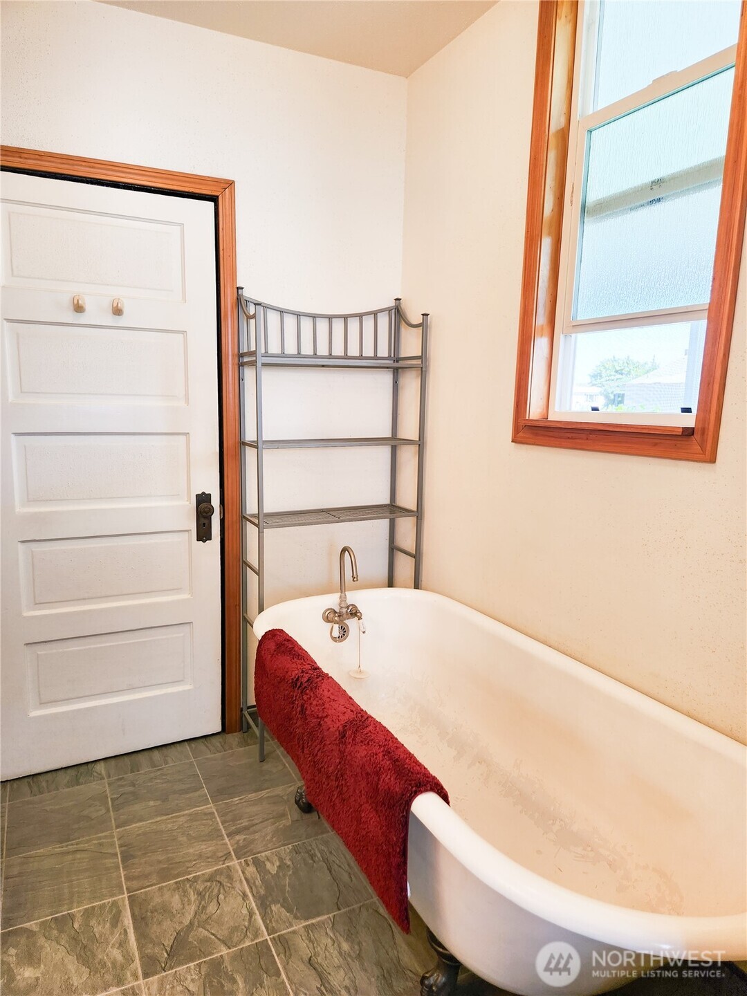 316 East Alder Avenue Ritzville, WA 99169 - Photo 8 of 35 a bed sitting in a bedroom next to a window