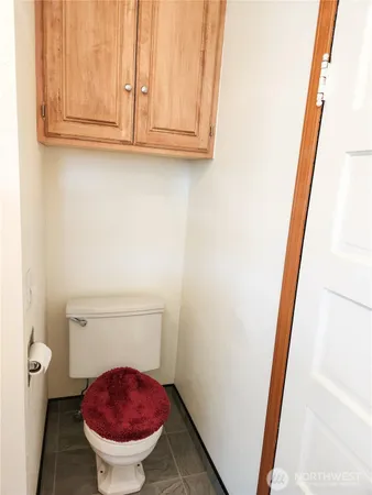 a bathroom with a toilet and a sink