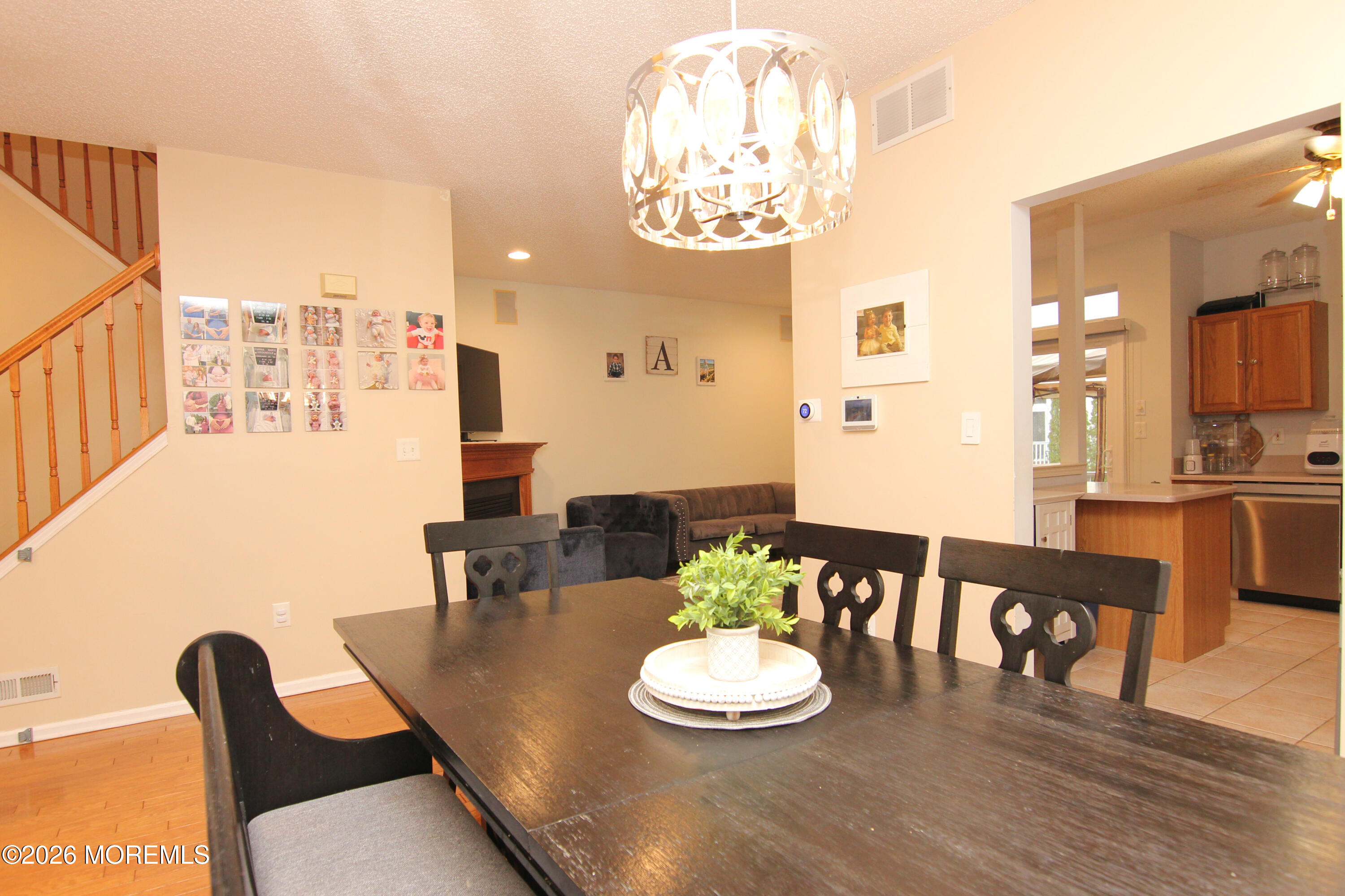 33 Austin Street Tinton Falls, NJ 07712 - Photo 38 of 46 a view of a dining room with furniture and wooden floor