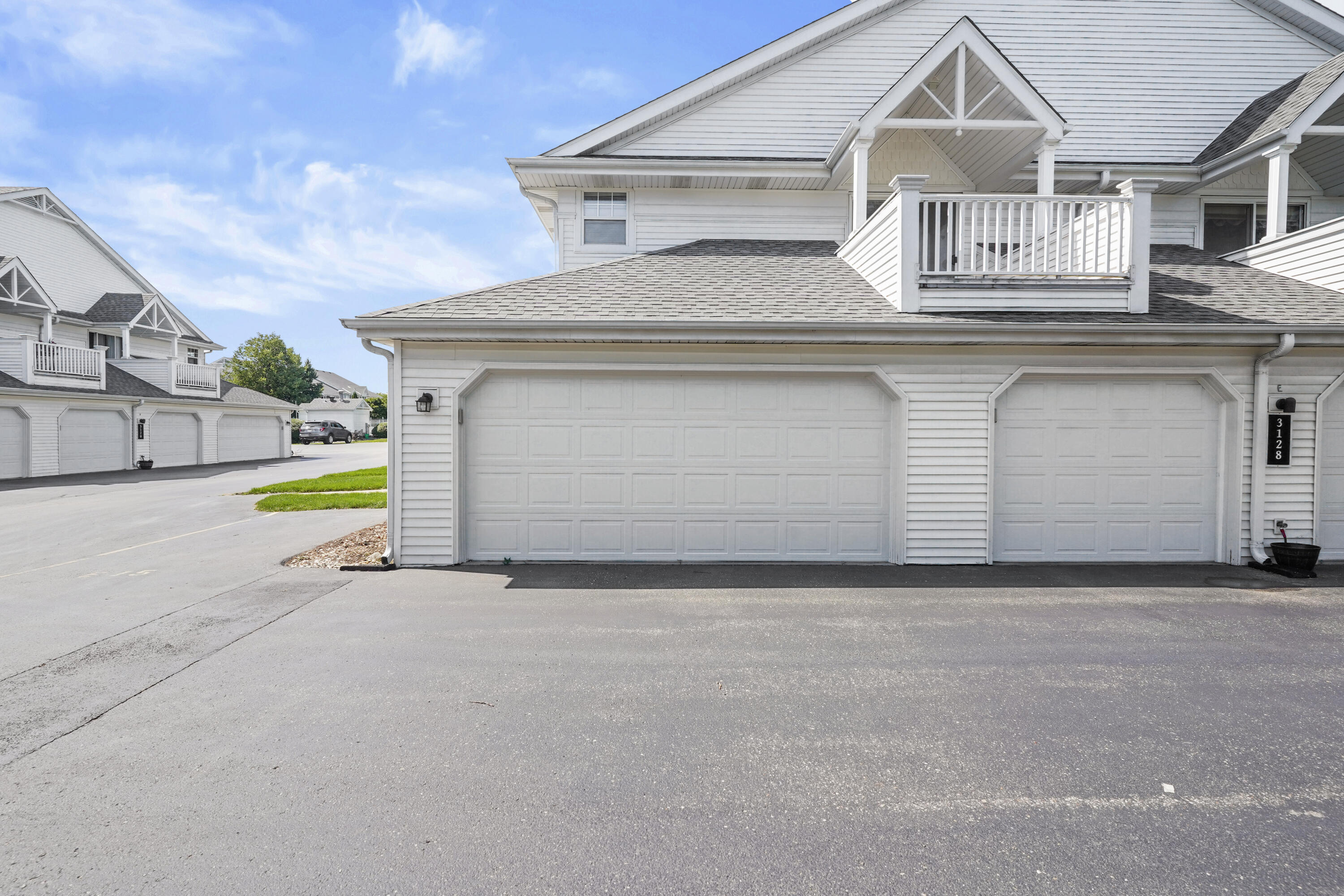 3128 Wood Road, Unit 16 Mount Pleasant, WI 53406 - Photo 2 of 28 2 Car Garage