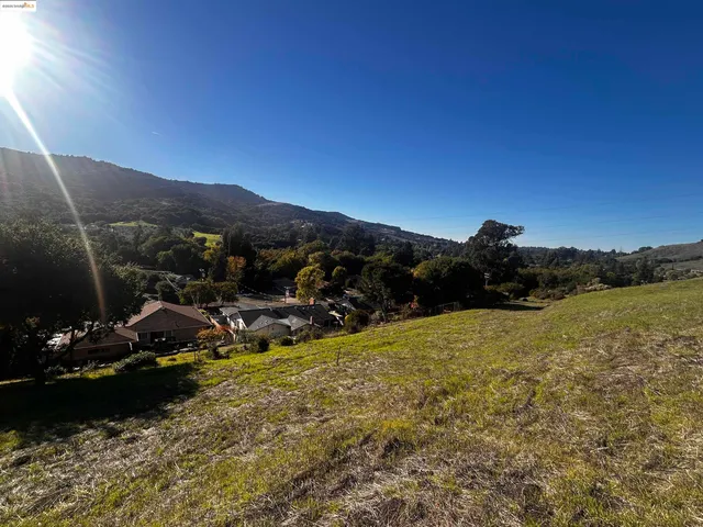 a view of a lake in middle of the town