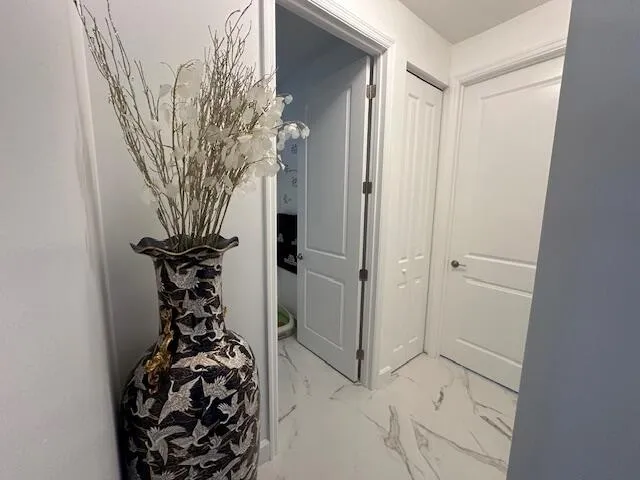 view of a room with window and glass door