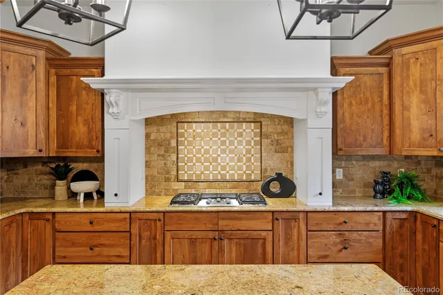 a kitchen with a sink cabinets and window