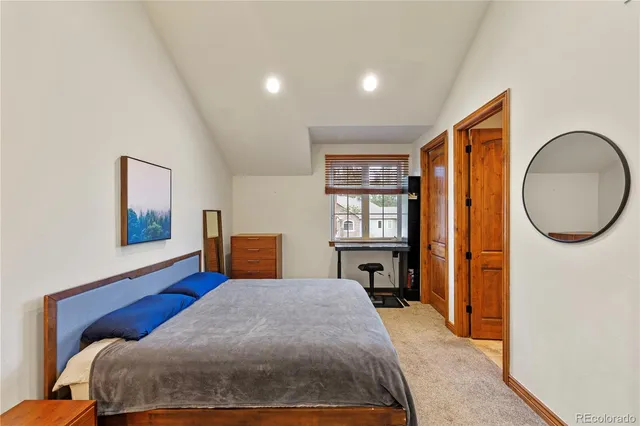 a bathroom with a sink a mirror and a bathtub