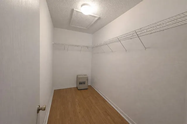 a view of small space with racks on the wall