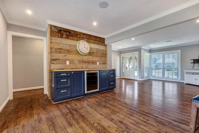 a view of a kitchen with a wooden floor