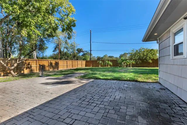 a view of a house with a street