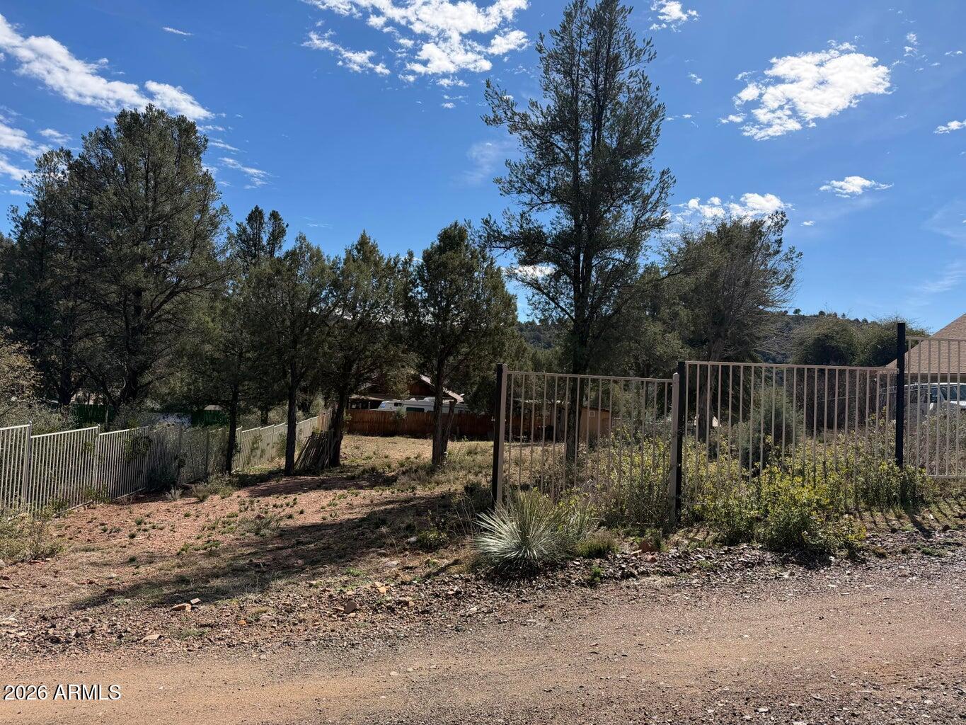 161 West Gene Drive, Unit 15 Payson, AZ 85541 - Photo 1 of 18 a view of backyard with green space