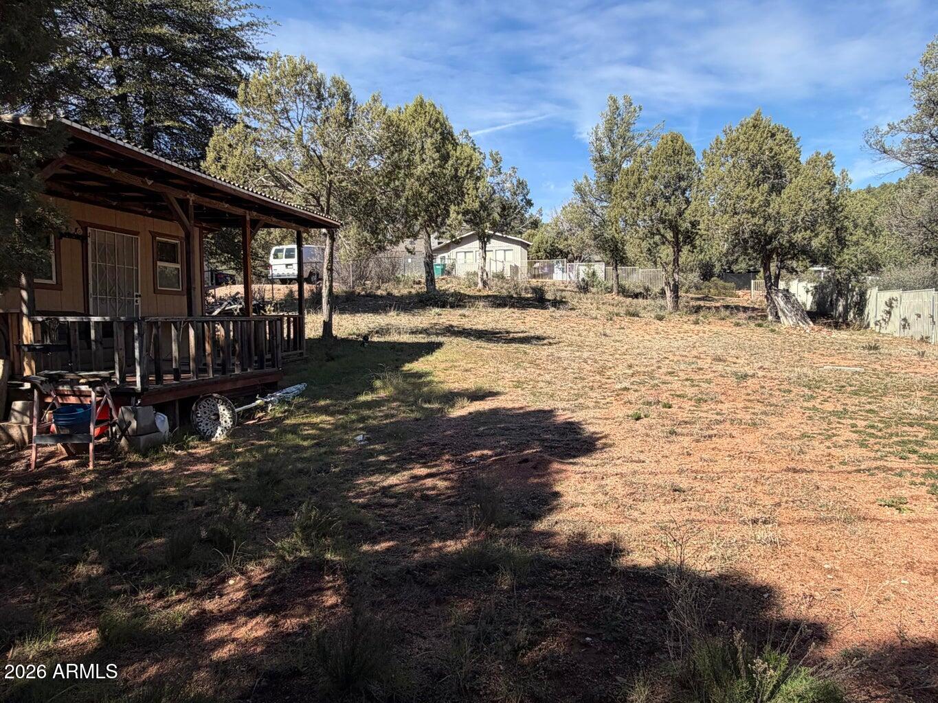 161 West Gene Drive, Unit 15 Payson, AZ 85541 - Photo 6 of 18 a view of a yard with plants and trees