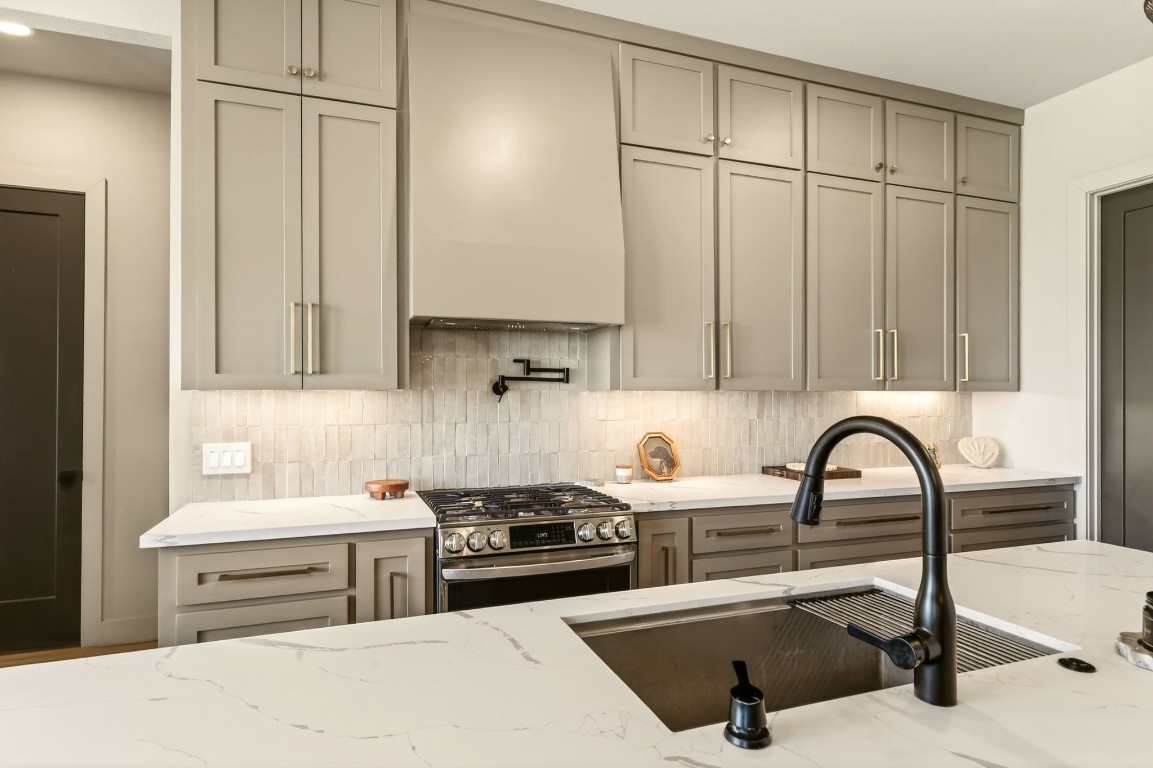115 Country View Lane Schulenburg, TX 78956 - Photo 14 of 44 a kitchen with a sink cabinets and appliances